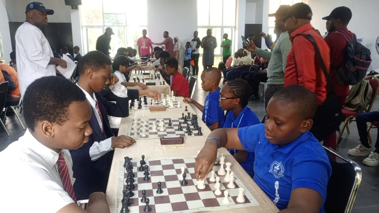 Students competing in chess